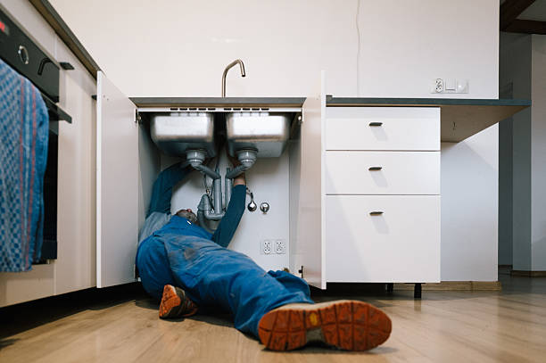 Professional Drain Cleaning technician working in Williamsburg, KY